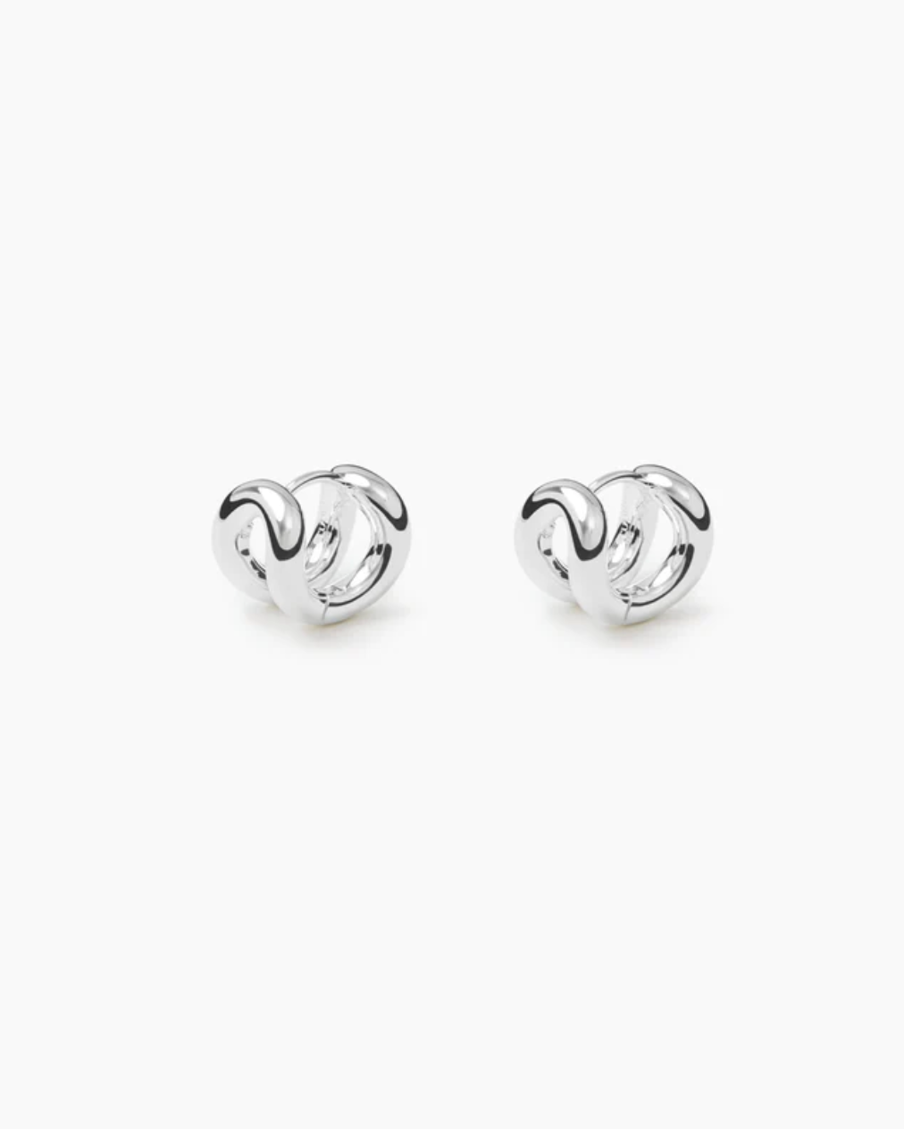 Pair of silver earrings on a white background