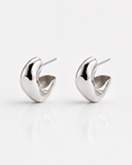 Pair of silver earrings on a white background