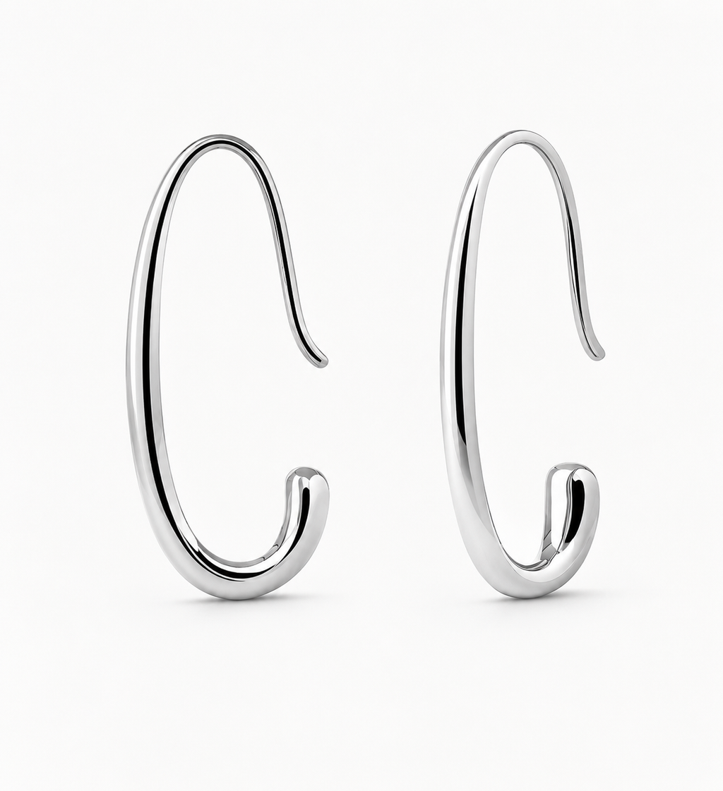 Pair of silver hoop earrings on a white background