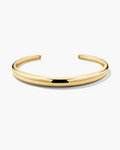 Gold bangle on a white background