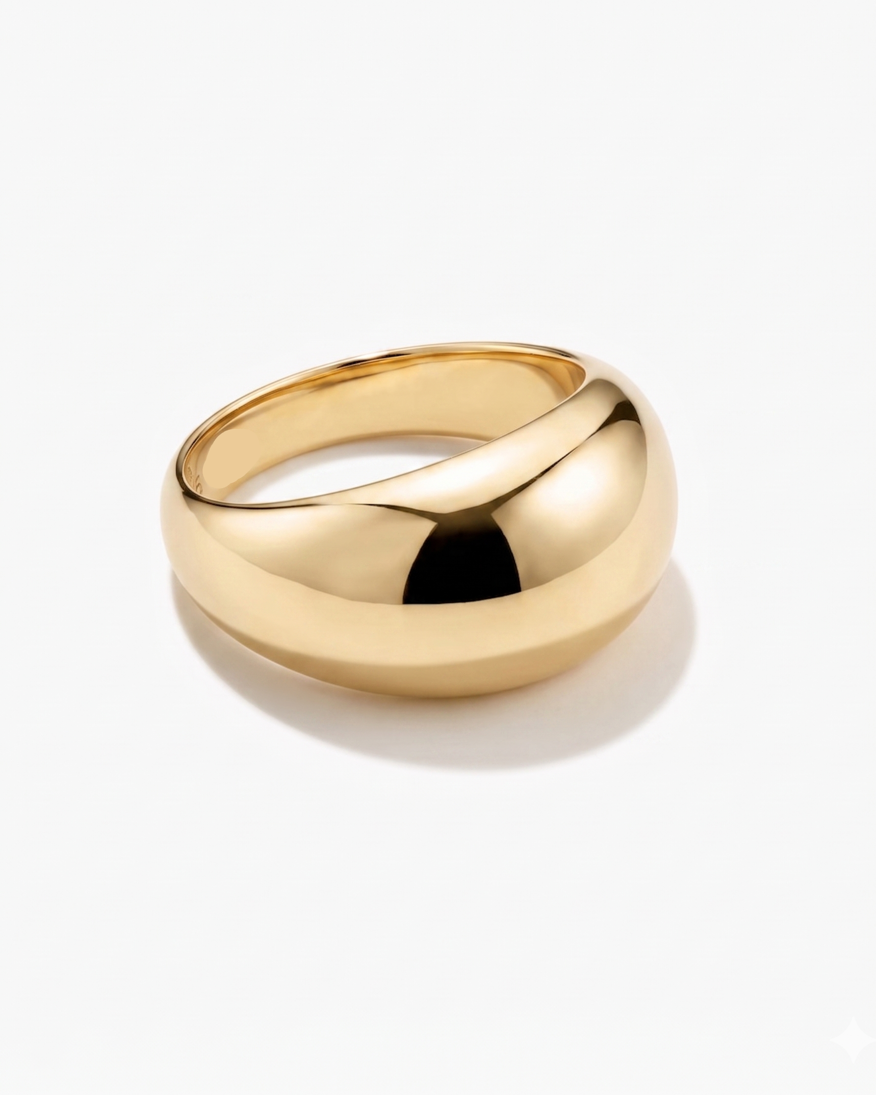 Gold ring on a white background