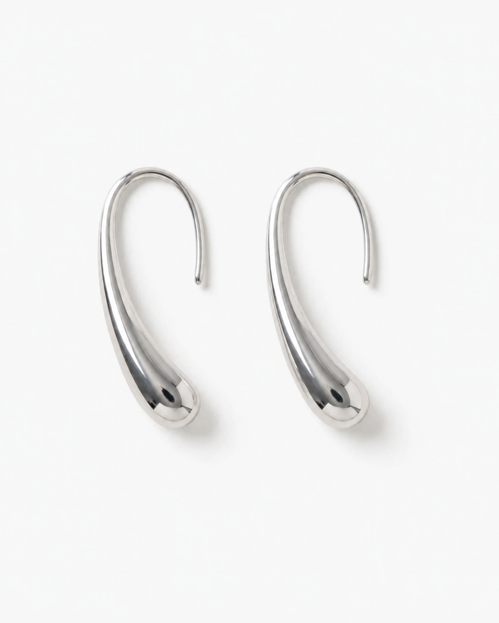 Pair of silver hoop earrings on a white background