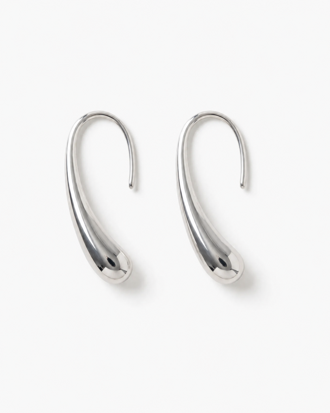 Pair of silver hoop earrings on a white background