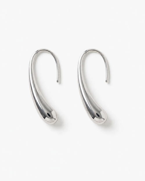 Pair of silver hoop earrings on a white background