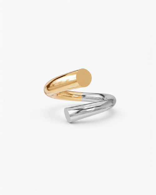 Two-toned gold and silver ring on a white background