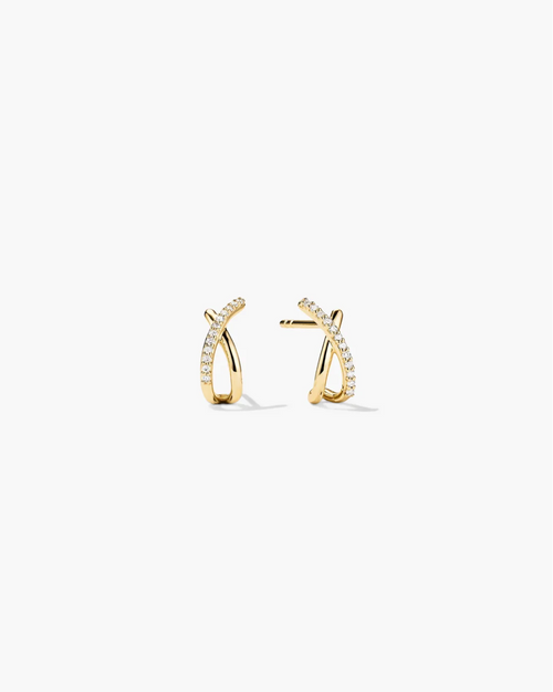 Pair of gold hoop earrings with small diamonds on a white background