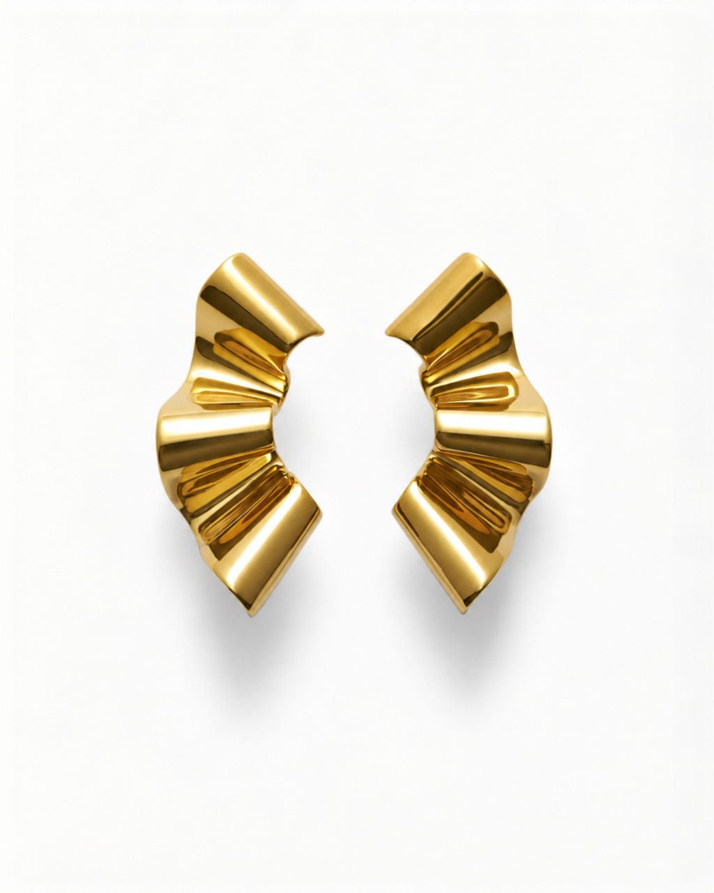 Gold earrings with a fan-like design on a white background