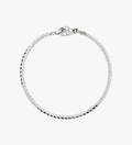 Silver bracelet on a white background