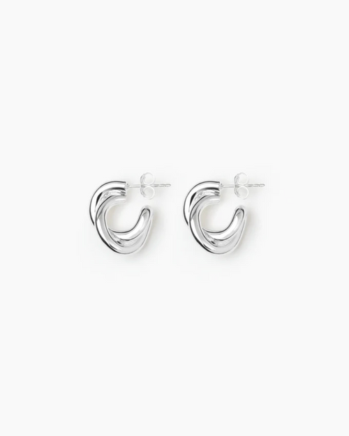 Pair of silver hoop earrings on a white background