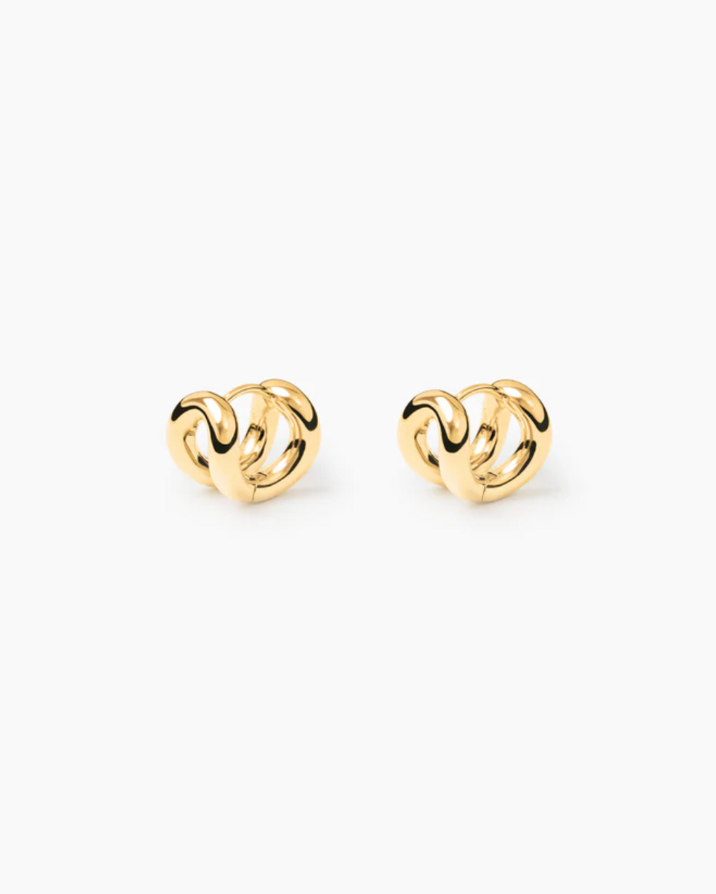 yellow gold earring with on a white background